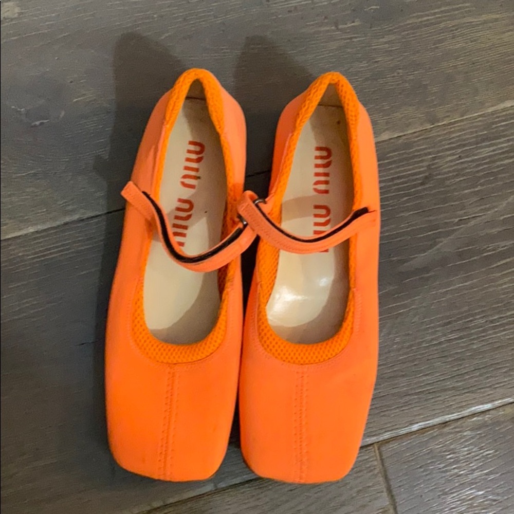 Miu Miu orange flat shoes